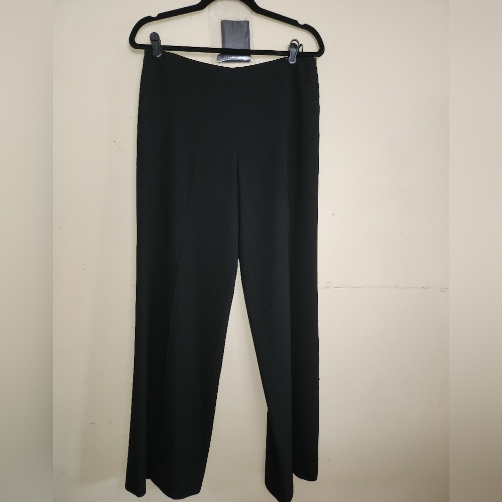 CHANEL Black wool pants lined in black satin with wide leg and side zip